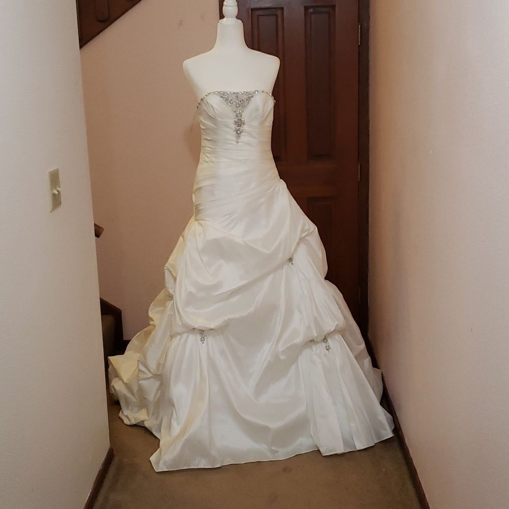 Maggie Sottero haute couture wedding gown. Imperial size 8, off white.